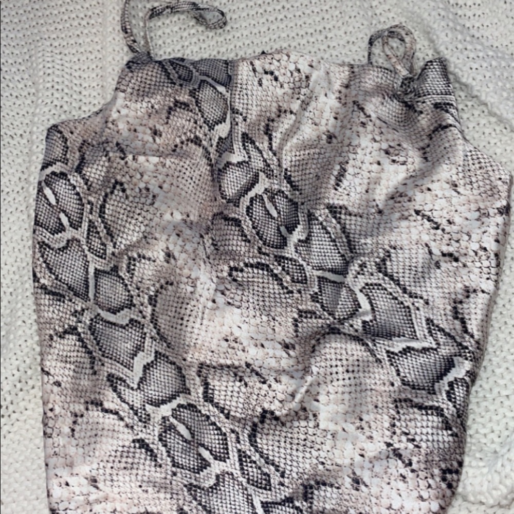 Snake skin print fits to small